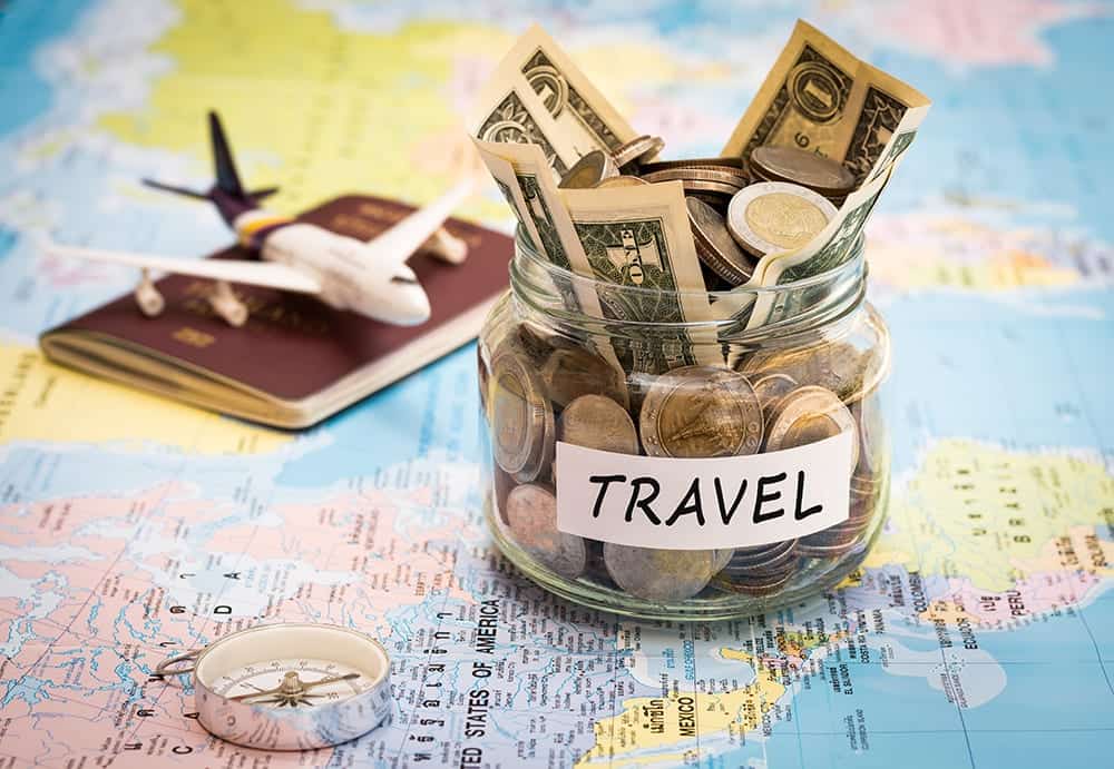 how to save money on holidays abroad